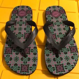 Ugg black flip flop. Size 6. Never worn